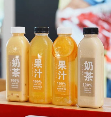 chai trà sữa bằng nhựa thực tế với tay cầm