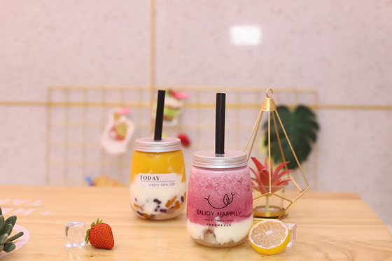 Các chai trà sữa có nắp vít để đóng gói nước trái cây rõ ràng
