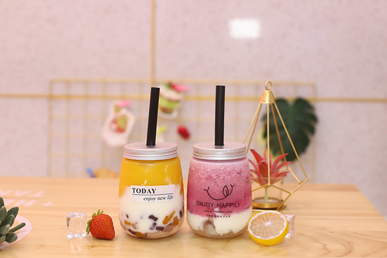 Các chai trà sữa có nắp vít để đóng gói nước trái cây rõ ràng