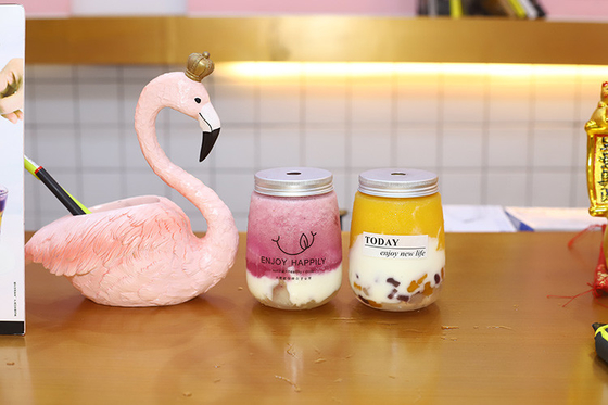 chai trà sữa rõ ràng chống rò rỉ với tay cầm giữ uống an toàn và không rắc rối
