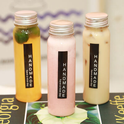 Leak proof Milk Tea Bottles Plastic Screw on Lid Durable Reusable Containers Ideal for Beverage Packaging and Storage