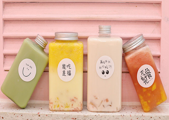 Chai trà sữa nước ép bằng nhựa 8oz có nắp đậy bằng chất liệu giả