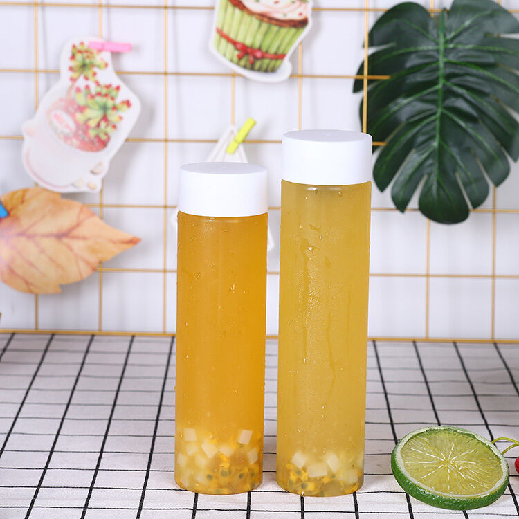 Chai đựng Trà Sữa Tay cầm 0.5kg Nắp Vặn Chống Rò Rỉ Lý tưởng cho Đóng gói và Phân phối Đồ uống Thương mại